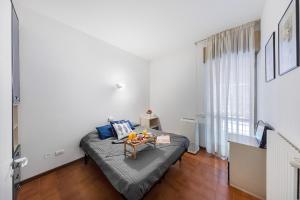 A seating area at Splendid Apartment PT-1 sul lago by Wonderful Italy