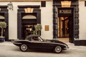 a black car parked in front of a building at Rosselli AX Privilege in Valletta