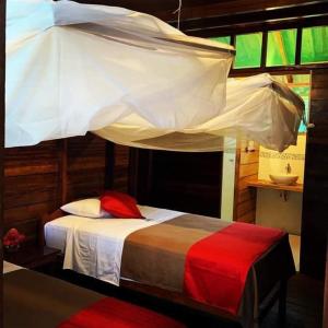 Кровать или кровати в номере Estancia Bello Horizonte