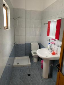 Ванная комната в Hotel Geraldo