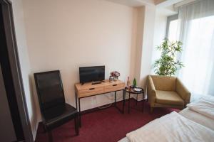 TV a/nebo společenská místnost v ubytování Wellness hotel Lucia