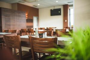 Restoran või mõni muu söögikoht majutusasutuses Wellness hotel Lucia
