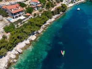 an aerial view of a boat in the water at Villa Amfora in Prizba