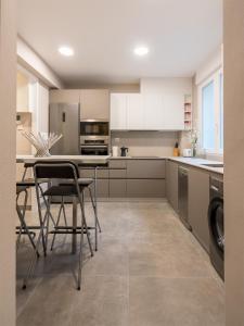 Kuchyň nebo kuchyňský kout v ubytování Ibarrola Apartment by People Rentals