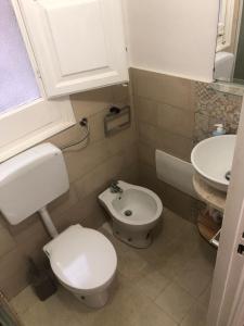 Vannas istaba naktsmītnē Trapani Apartments