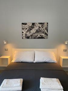 Posteľ alebo postele v izbe v ubytovaní B&B 8 Marzo