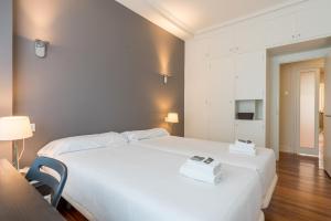 Postel nebo postele na pokoji v ubytování Ibarrola Apartment by People Rentals