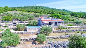 an aerial view of a house on a hill at Holiday Home Zule in Žrnovo
