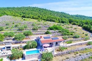 an aerial view of a house with a garden at Holiday Home Zule in Žrnovo