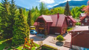 an overhead view of a house with a car parked in front at Wilczy Wodospad in Karpacz