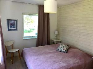 Postel nebo postele na pokoji v ubytování Kiladalens Golf & Lodge