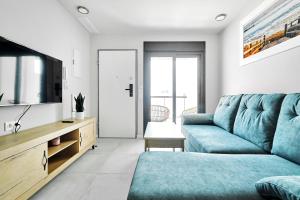 Televízia a/alebo spoločenská miestnosť v ubytovaní Apartment Onde