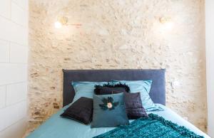 Ένα ή περισσότερα κρεβάτια σε δωμάτιο στο L'indiscrete Love Room - Hammam-Sauna-SPA