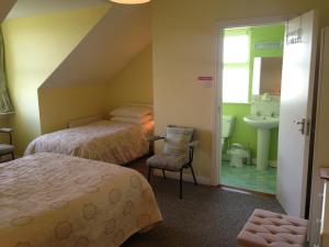 Postel nebo postele na pokoji v ubytování An Gleann Accommodation