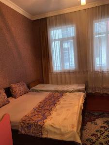 Posteľ alebo postele v izbe v ubytovaní Resort In Gonio