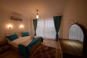 Ένα ή περισσότερα κρεβάτια σε δωμάτιο στο Hera Apart +19 φωτογραφίες