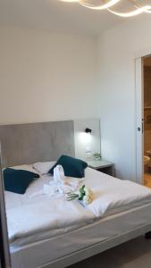 Postel nebo postele na pokoji v ubytování Hotel Vienna