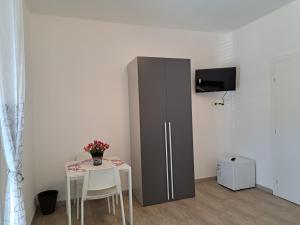 TV a/nebo společenská místnost v ubytování Da Orazio