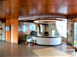 a lobby with a counter in a building at Residence _Capo Gallo in Palermo