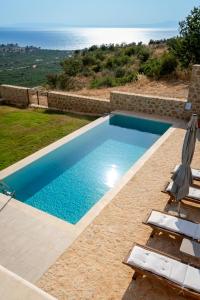 The swimming pool at or close to Kika Residences