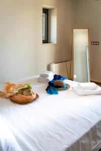 A bed or beds in a room at Kika Residences