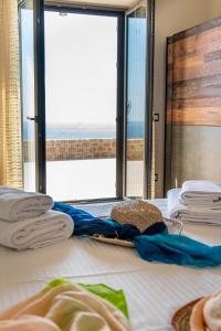 A bed or beds in a room at Kika Residences