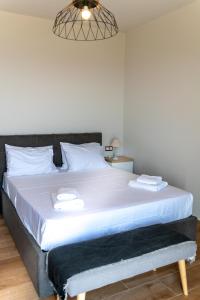 A bed or beds in a room at Kika Residences