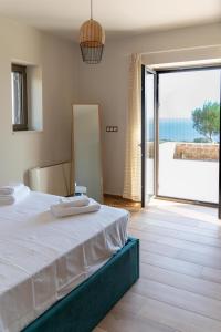 A bed or beds in a room at Kika Residences Még 37 kép