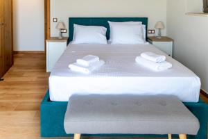 A bed or beds in a room at Kika Residences