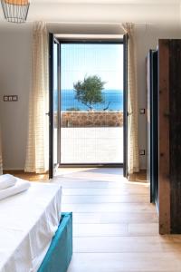 A bed or beds in a room at Kika Residences