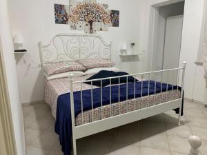 Postel nebo postele na pokoji v ubytování Ca' ToscaLina