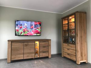 TV a/nebo společenská místnost v ubytování An't Grachten