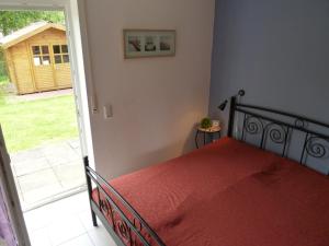 Un pat sau paturi într-o cameră la Njörd