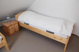 Postel nebo postele na pokoji v ubytování Wiesenblick Fenja