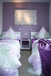 Postel nebo postele na pokoji v ubytování Kiek up de Gracht