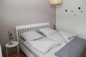 Postel nebo postele na pokoji v ubytování Biene