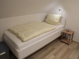 Postel nebo postele na pokoji v ubytování Fiete