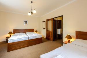 Postel nebo postele na pokoji v ubytování Valdštejn + 46 fotografií