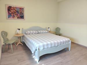 Giường trong phòng chung tại Agriturismo Corte Ambrosi