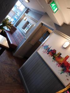 an overhead view of a room with a table with flowers at The City Hotel in Durham