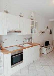 Kjøkken eller kjøkkenkrok på “L’alcova delle Sirene”