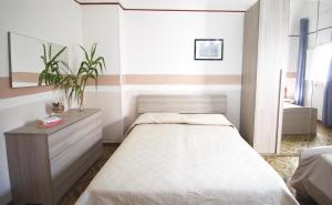 Posteľ alebo postele v izbe v ubytovaní Casa Camoro a 150 mt dal mare