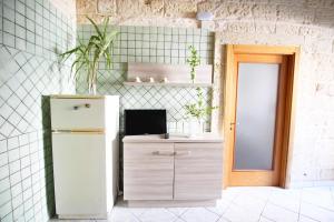 Kuchyňa alebo kuchynka v ubytovaní Casa Camoro a 150 mt dal mare