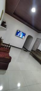 TV a/nebo společenská místnost v ubytování Sunset Villa