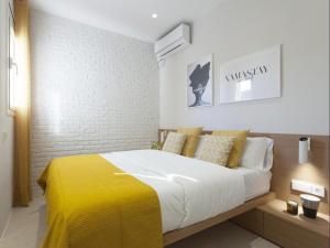 Posteľ alebo postele v izbe v ubytovaní Sunny Playa Apartment