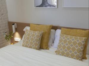 Posteľ alebo postele v izbe v ubytovaní Sunny Playa Apartment