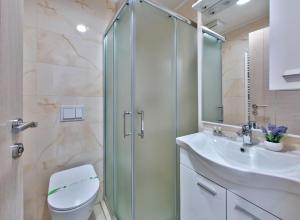 Koupelna v ubytování Hotel Dompes