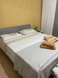 Posteľ alebo postele v izbe v ubytovaní Casa vacanza Giusi