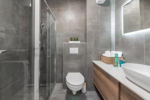 Kúpeľňa v ubytovaní New modern apartment Andrea + 4 fotografie