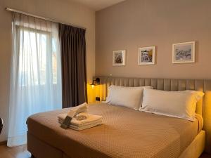 Postel nebo postele na pokoji v ubytování Oda Hotel Tirana